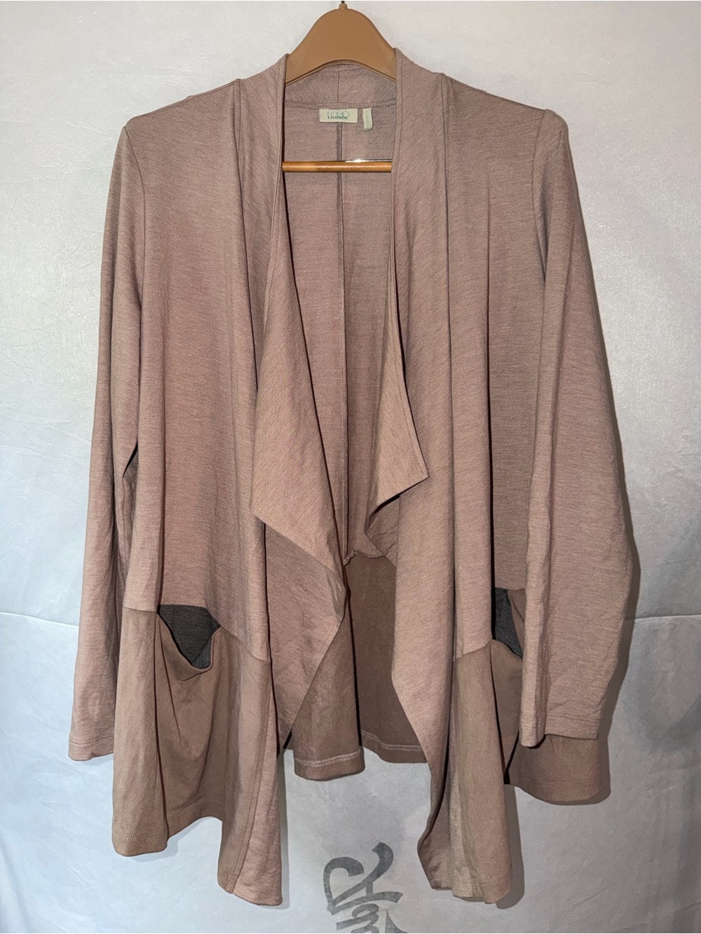 Women’s tan long sleeve cover up size large LOGO